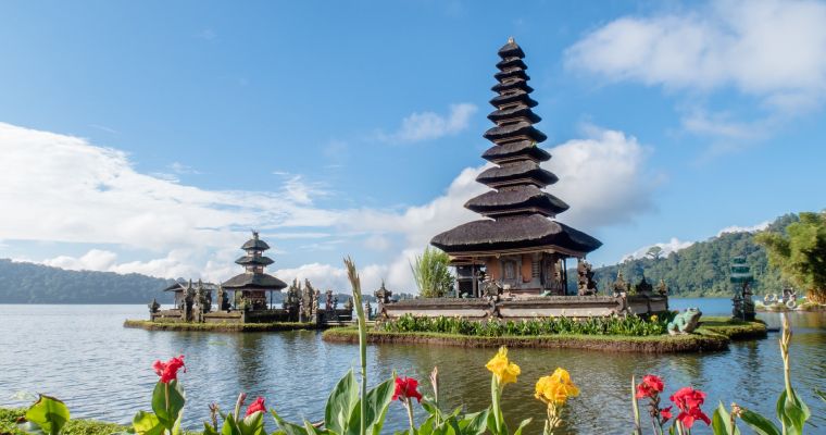 Water temple in Bali with flowers.