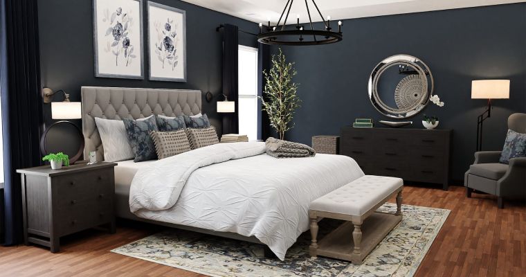 White bed in a dark blue bedroom.